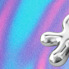 a metallic blob on a colorful background